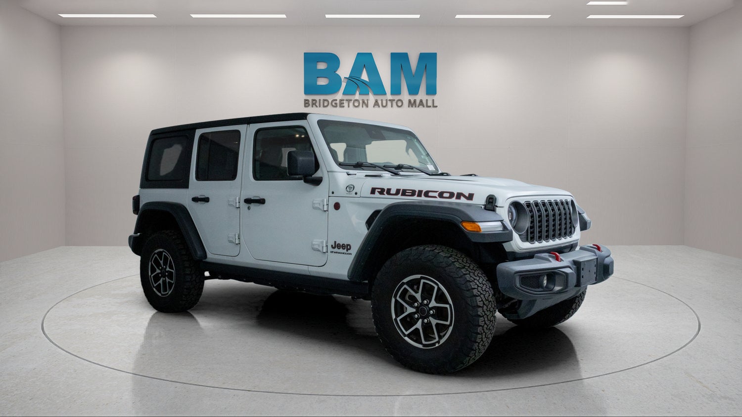 2025 Jeep Wrangler Rubicon in White — front three-quarter view