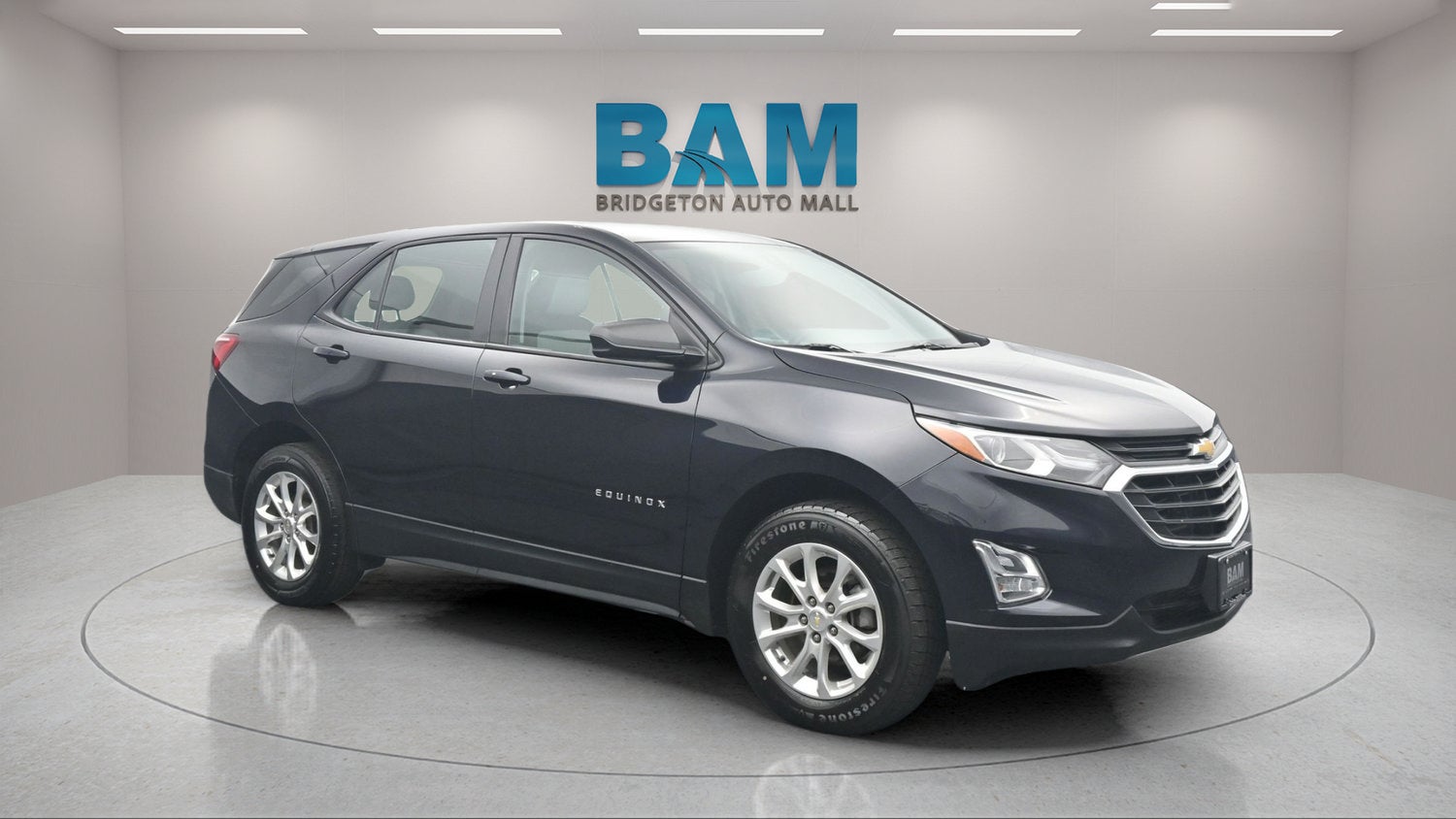 2021 Chevrolet Equinox LS in Midnight Blue Metallic — front three-quarter view