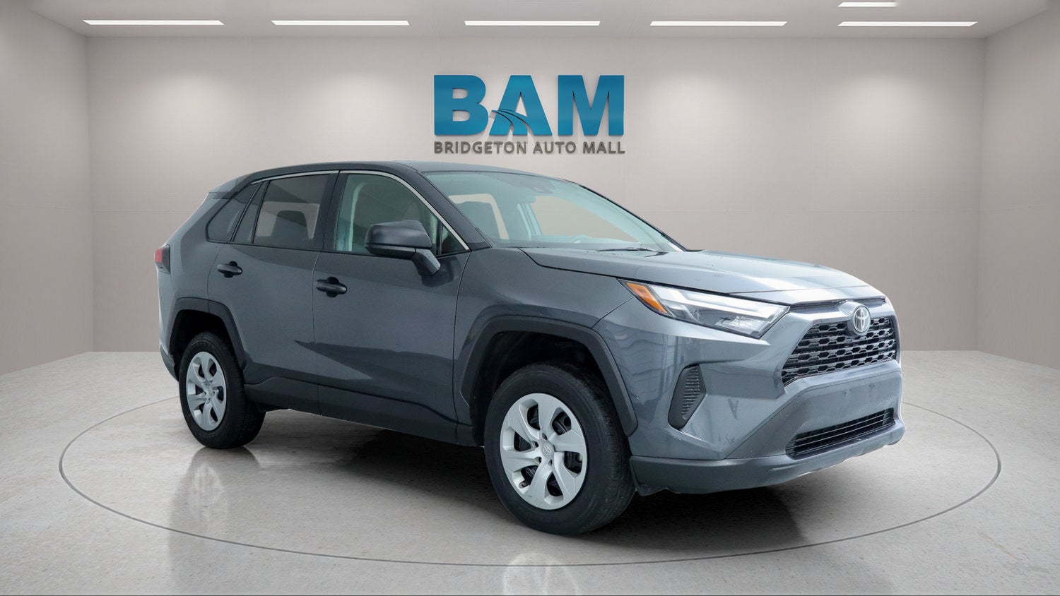 2024 Toyota RAV4 LE in Gray — front three-quarter view